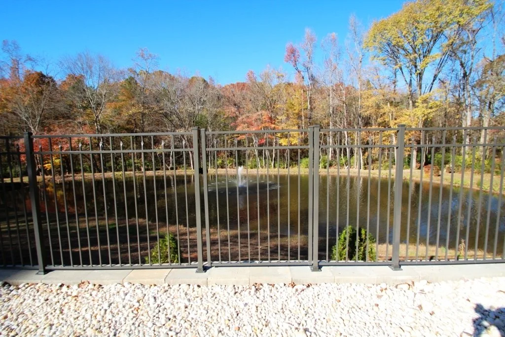 Bronze Fence on Wall.JPG