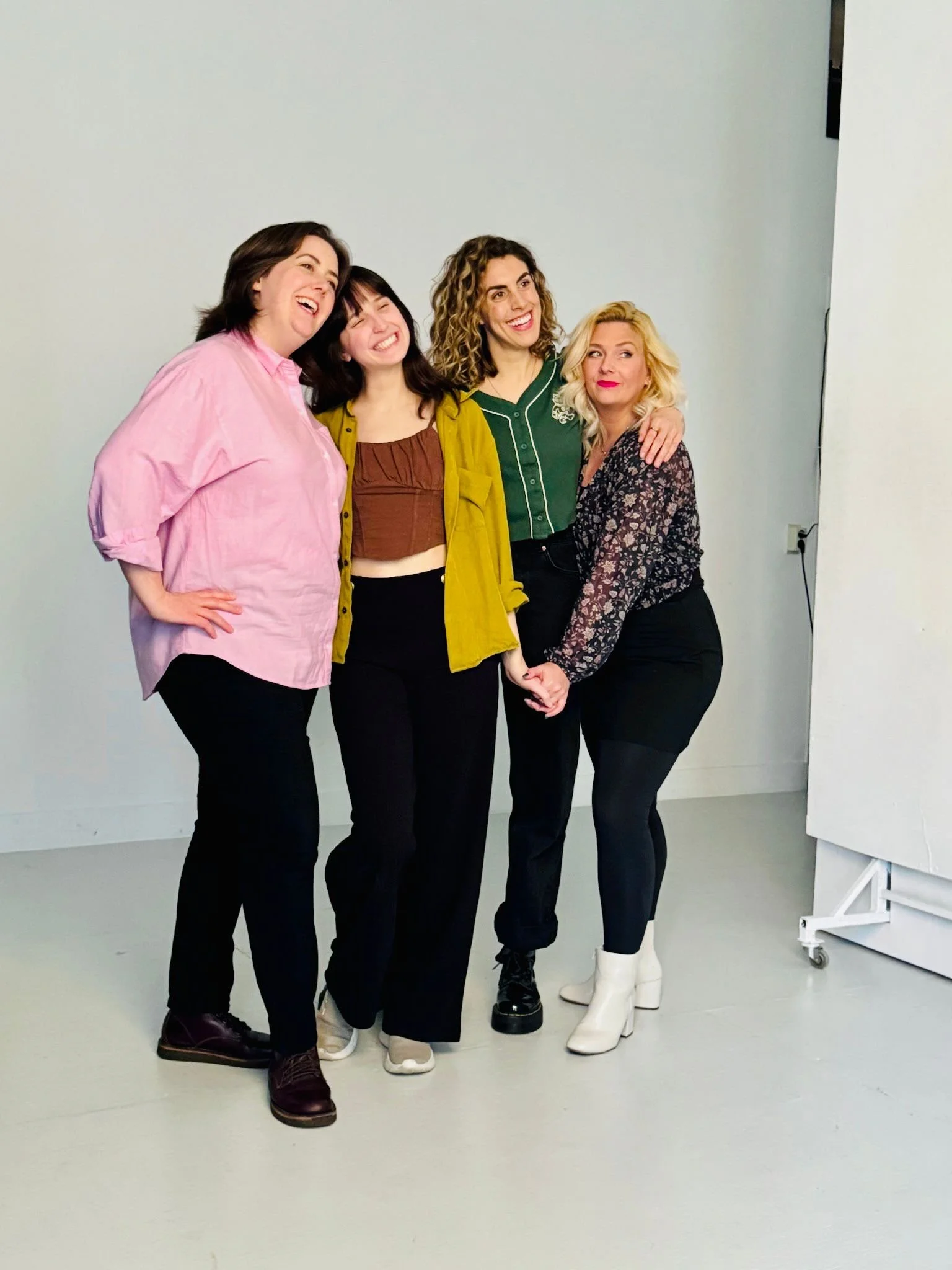 The Ladies of the Boom Chicago cast 2025 at a photoshoot (Katie Nixon, Laura Maynard, Meg Buzza, and Stacey Smith)