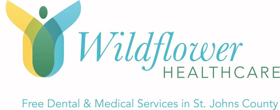 Wildflower Healthcare logo with stylized butterfly and text indicating free dental and medical services in St. Johns County.