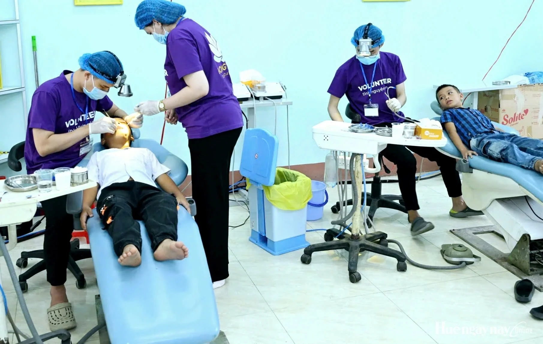 dentists treating patients at the dental clinic in A Luoi