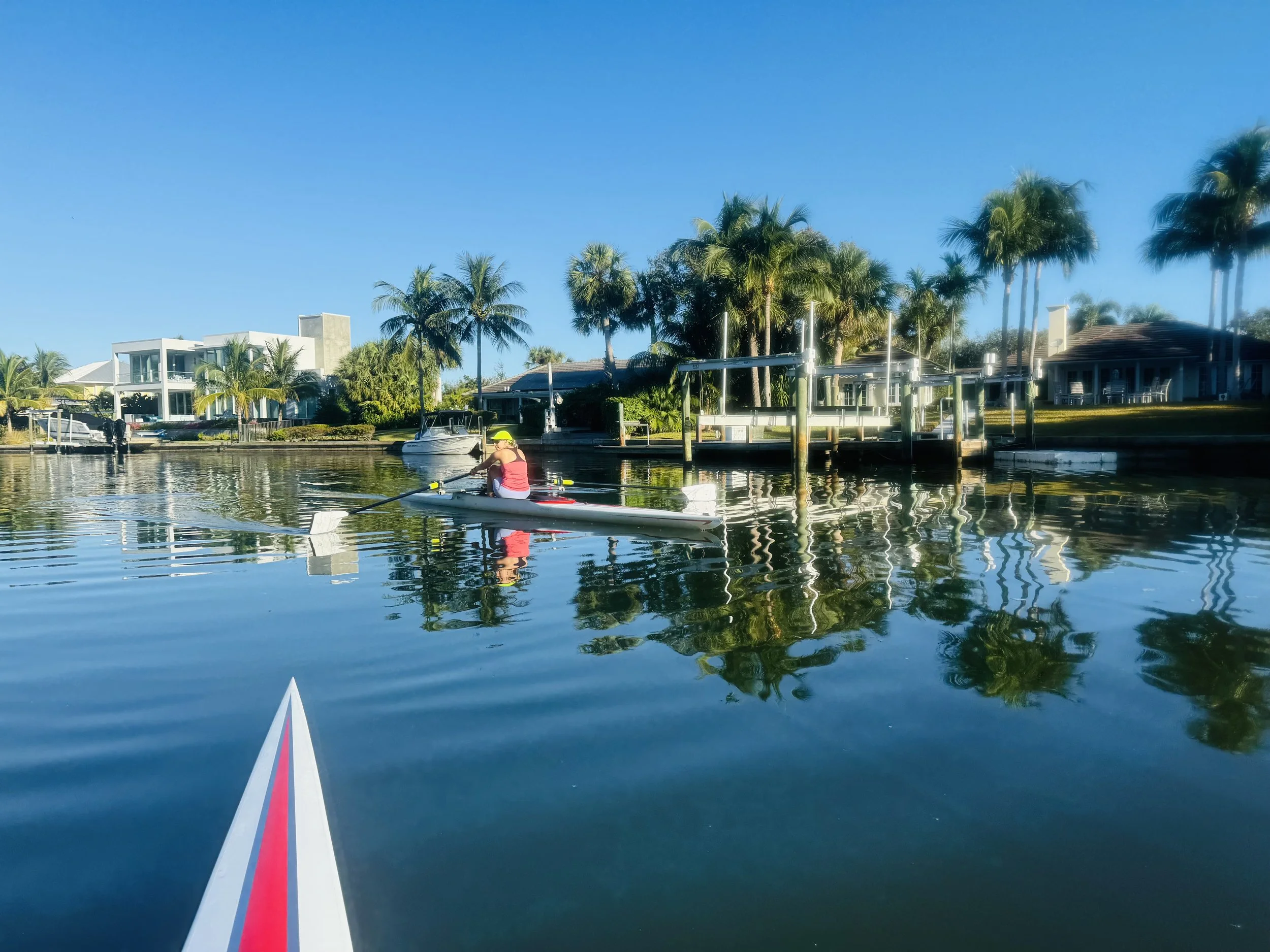 Member of the Vero Beach Rowing club rowing a single club boat near Central Beach