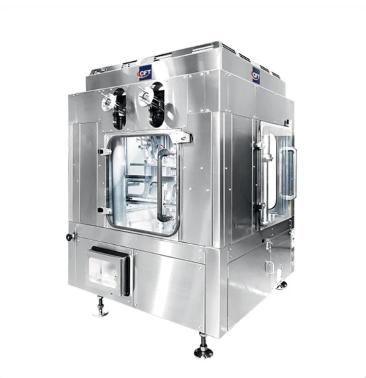 Stainless steel industrial machine, likely used for manufacturing or processing, with glass windows and control panels on the sides.