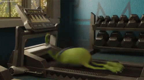 Gif of Mike Wizawski from Monsters Inc on a tredmill going too fast for him at the gym. He is spinning and struggling to turn the machine off