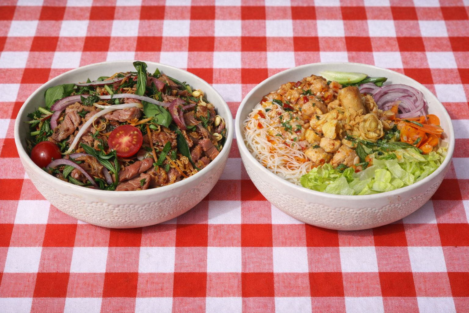 Couples Option - 1 x Chef's Thai Salad with Beef or Chicken & 1 x Chef's Vietnamese Salad with Beef or Chicken, 2 x Chilled Water & 2 x Sweet Energy Bites