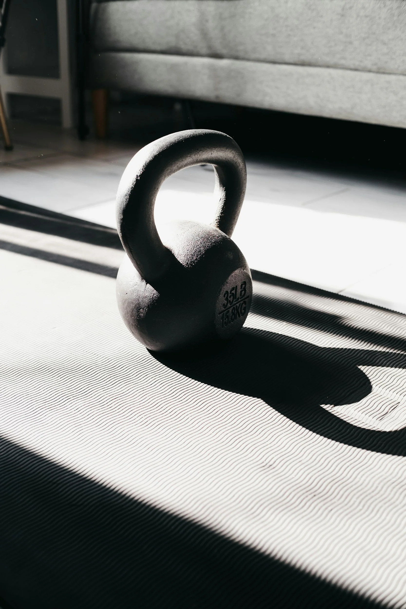 Kettlebell used in strength training, representative of kettlebell classes offered at Forme Studios in Chandler, AZ