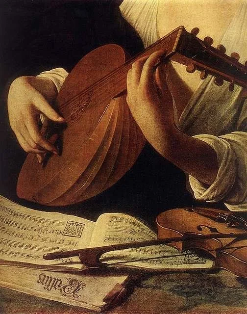 female playing harp