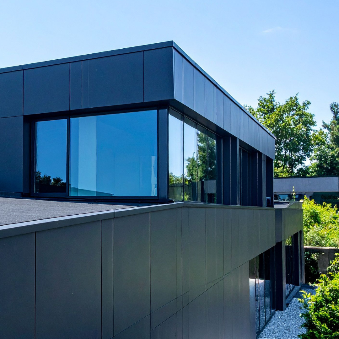 Silver reflective window tint Philippines installed on modern home for one way mirror privacy heat and UV reduction