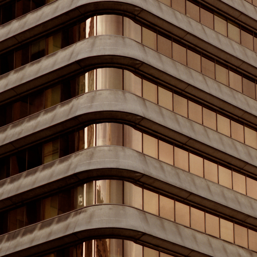 Bronze reflective window tint Philippines installed on commercial building for privacy heat and UV reduction