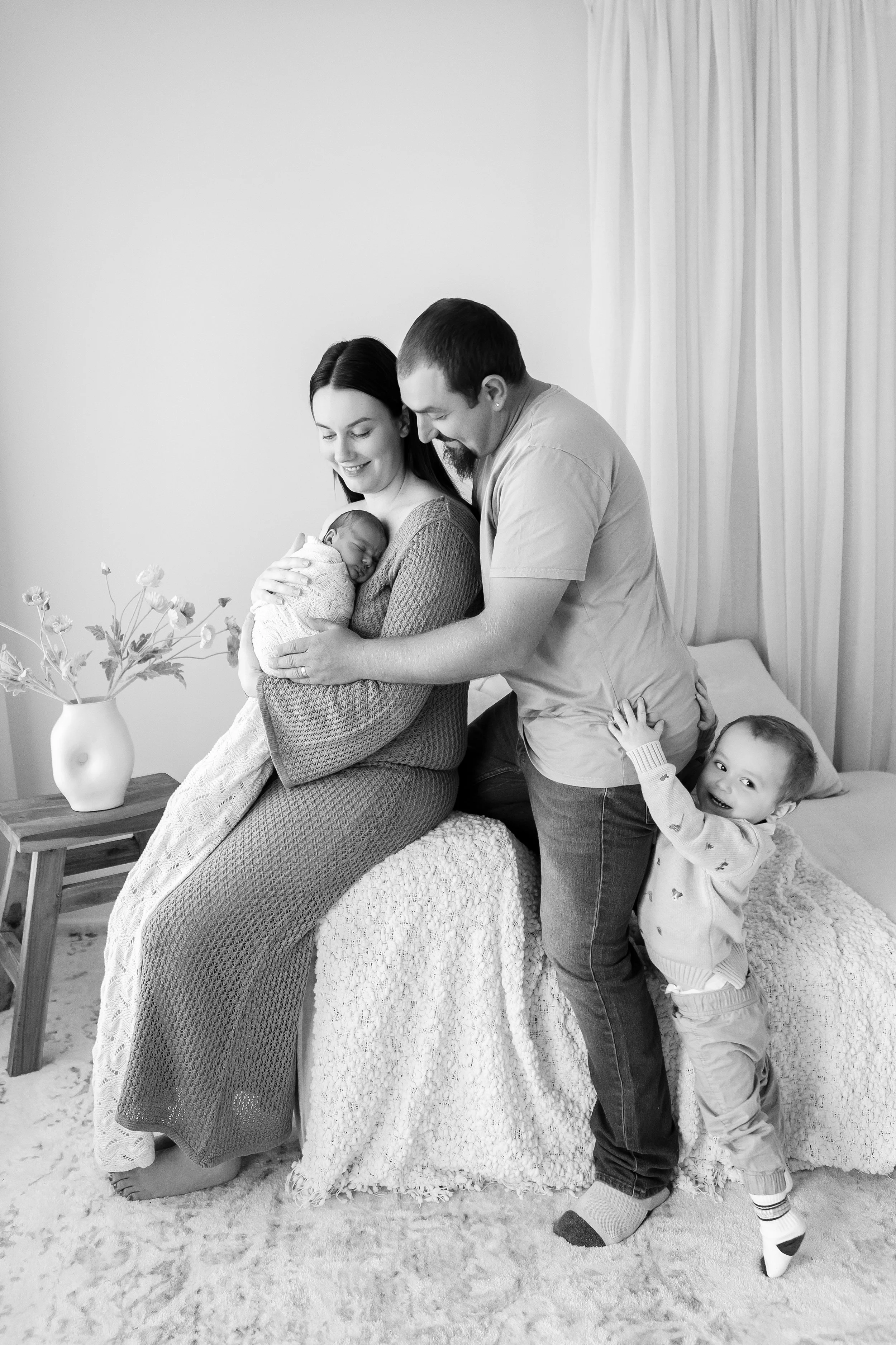 Nora and her family in the studio for a newborn session. Sweet newborn session for a little girl. 