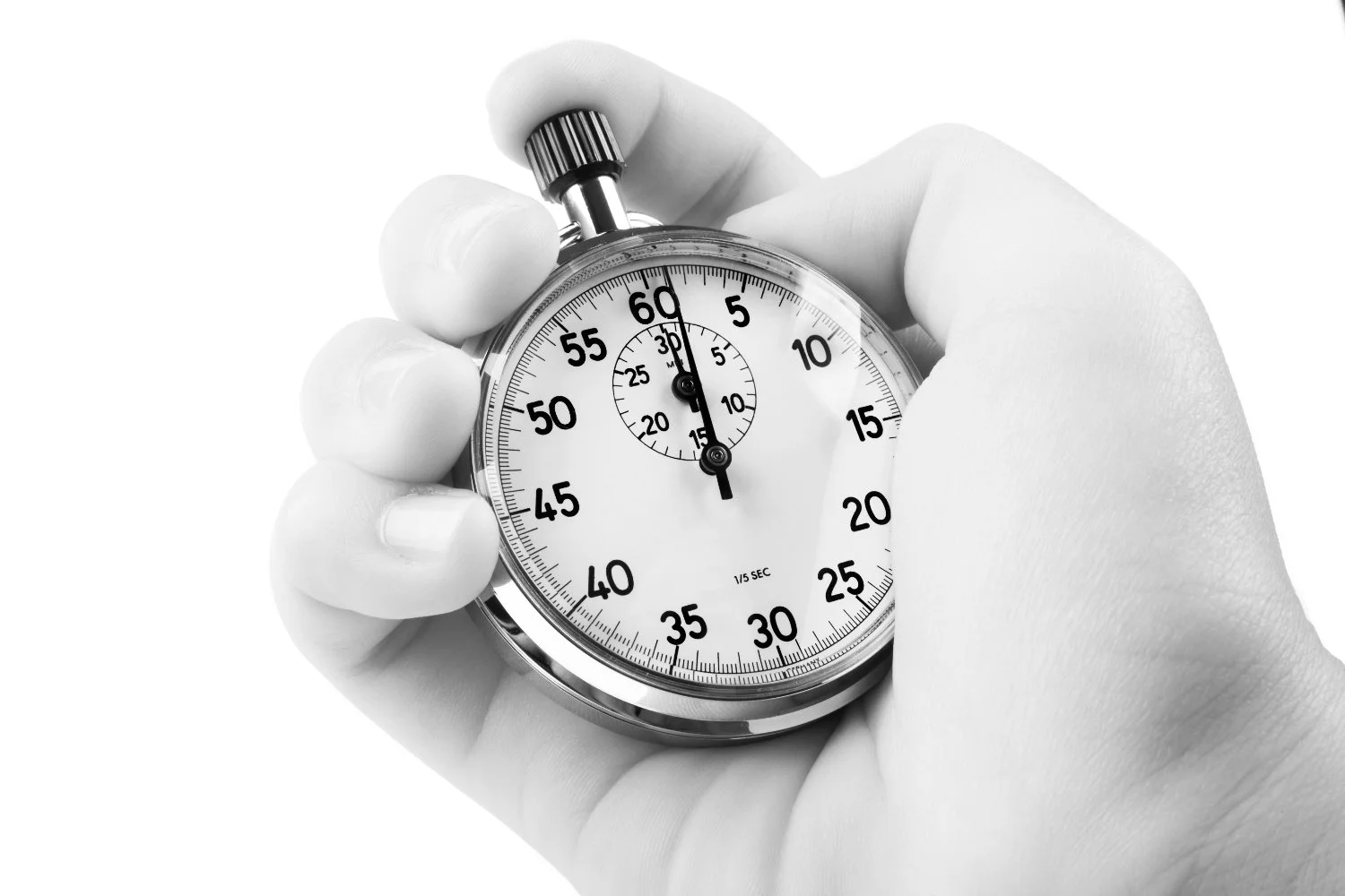 person holding a pocket watch