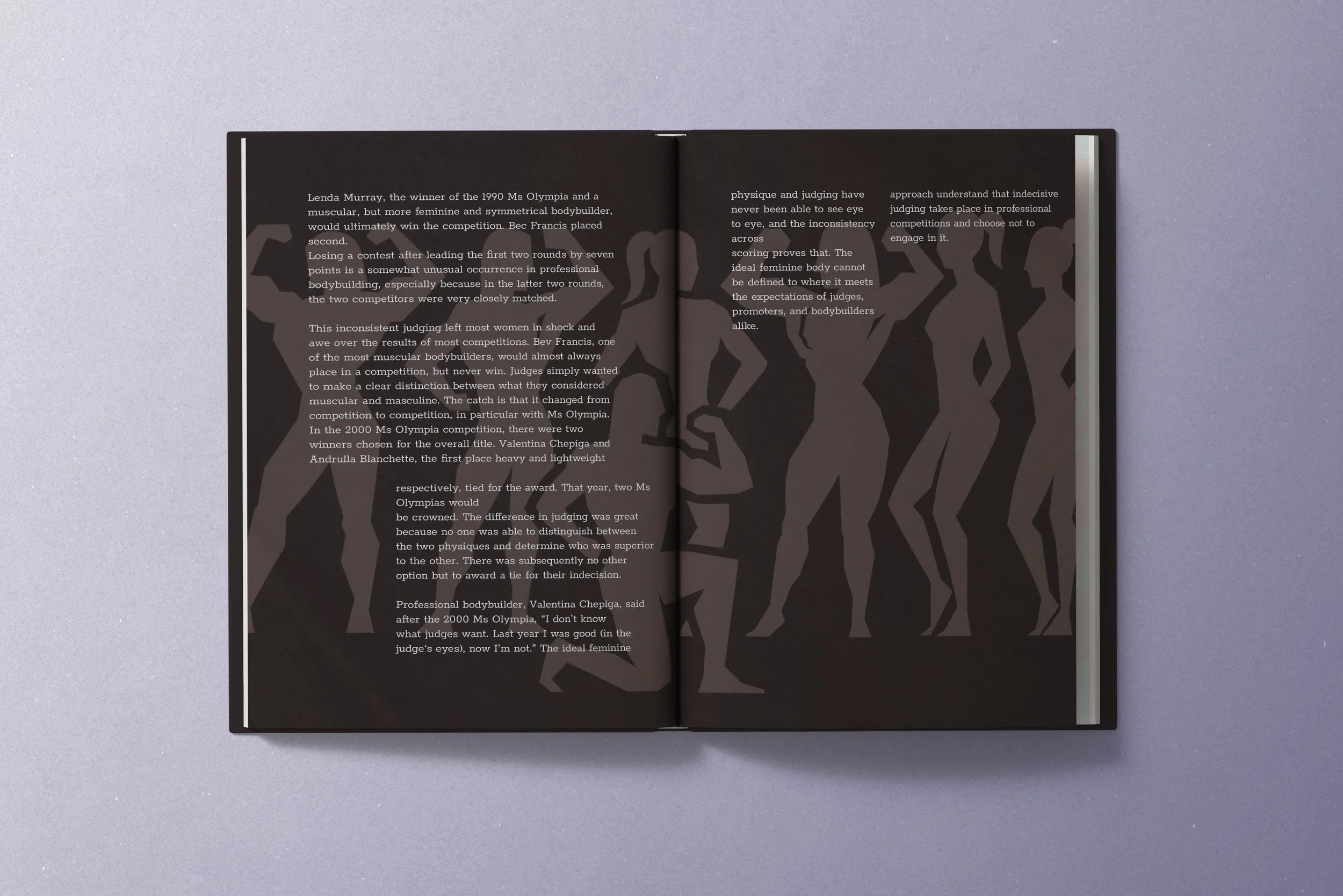 Open magazine with black and white pages featuring text about a bodybuilding competition, with a dark background and silhouette images of muscular figures on the right page.