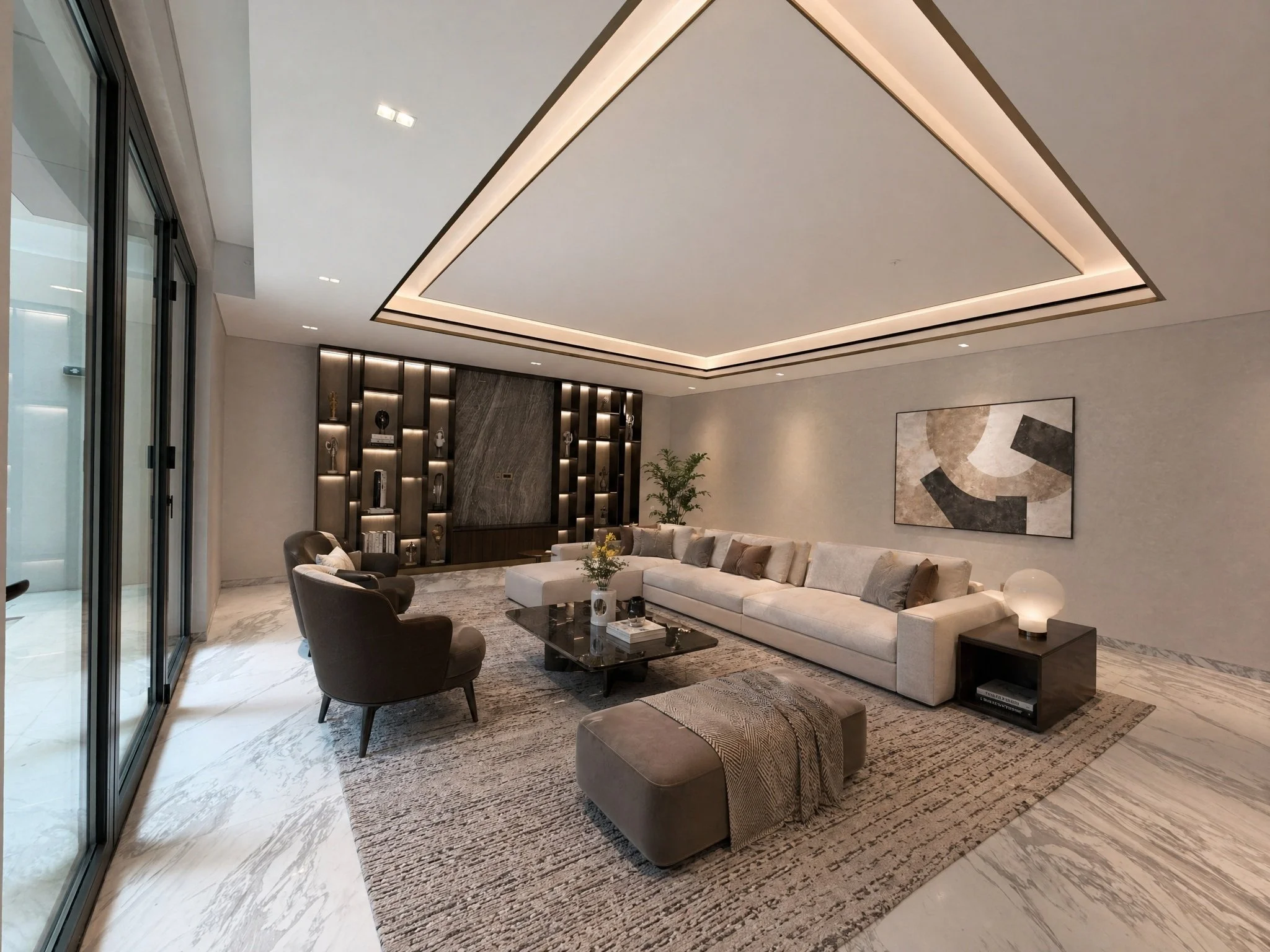 Modern living room with a vaulted ceiling featuring backlit recessed lighting, a large white sectional sofa with pillows, a black glass coffee table, two armchairs, a decorative rug, a large abstract artwork on the wall, built-in shelves with decorative items, and a potted plant.