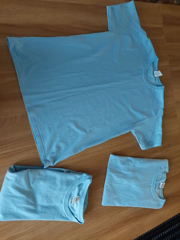 Light blue T-shirt. 12-13y. Fruit of the Loom