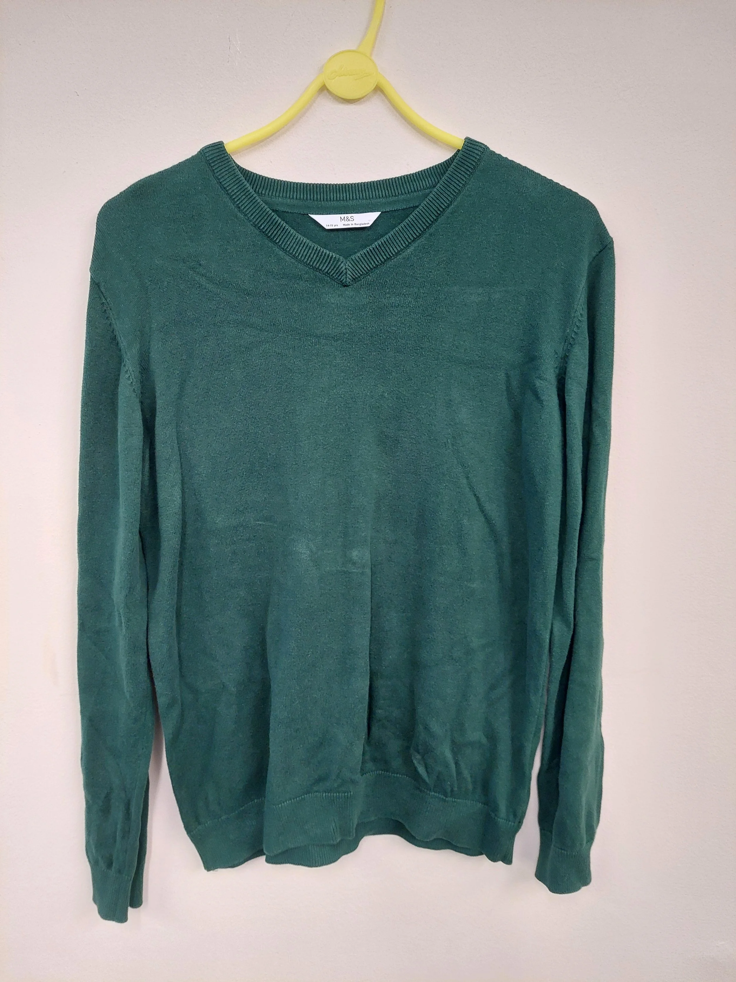 Green v-neck jumper