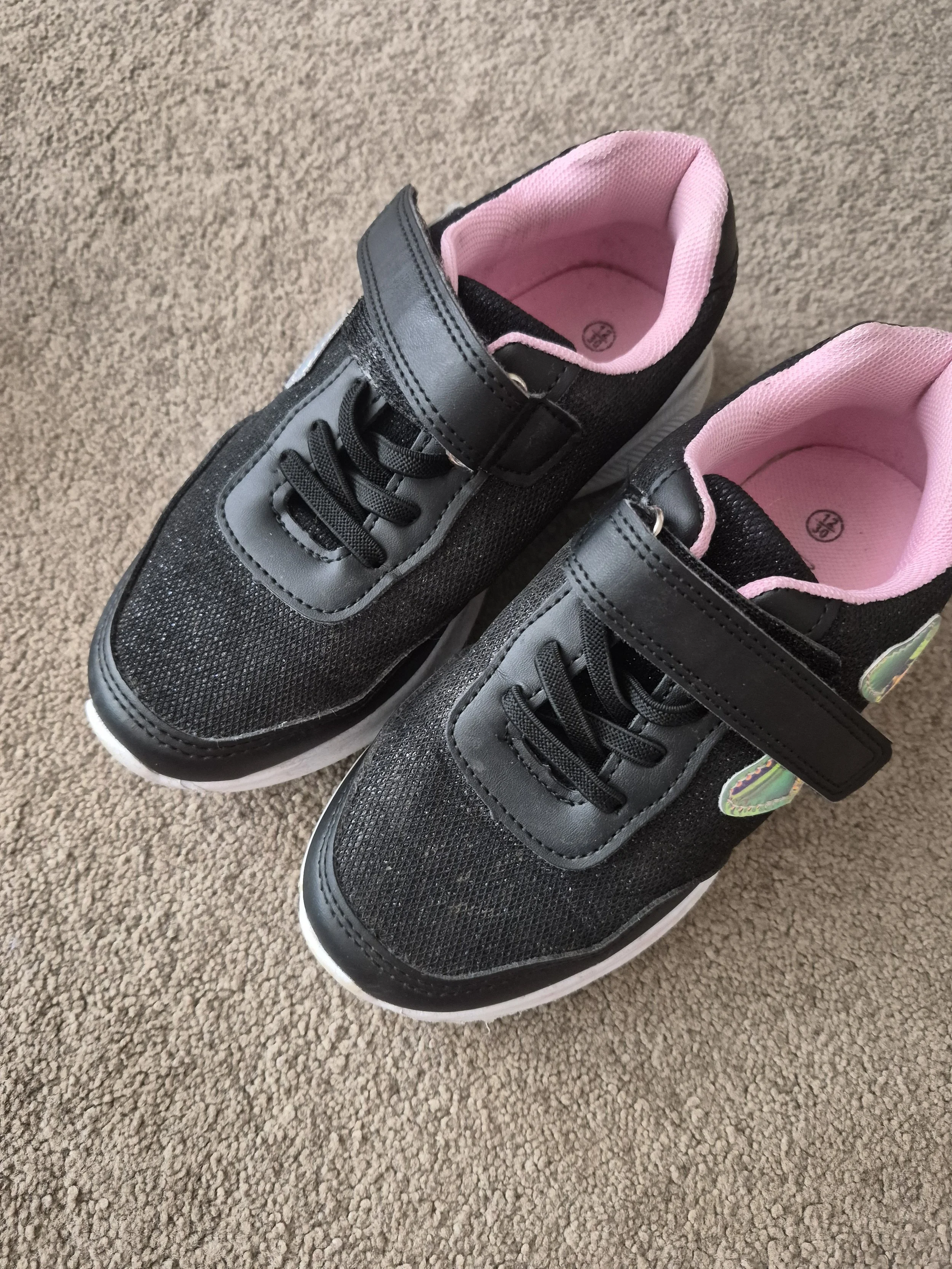 Girls black trainers. UK 12