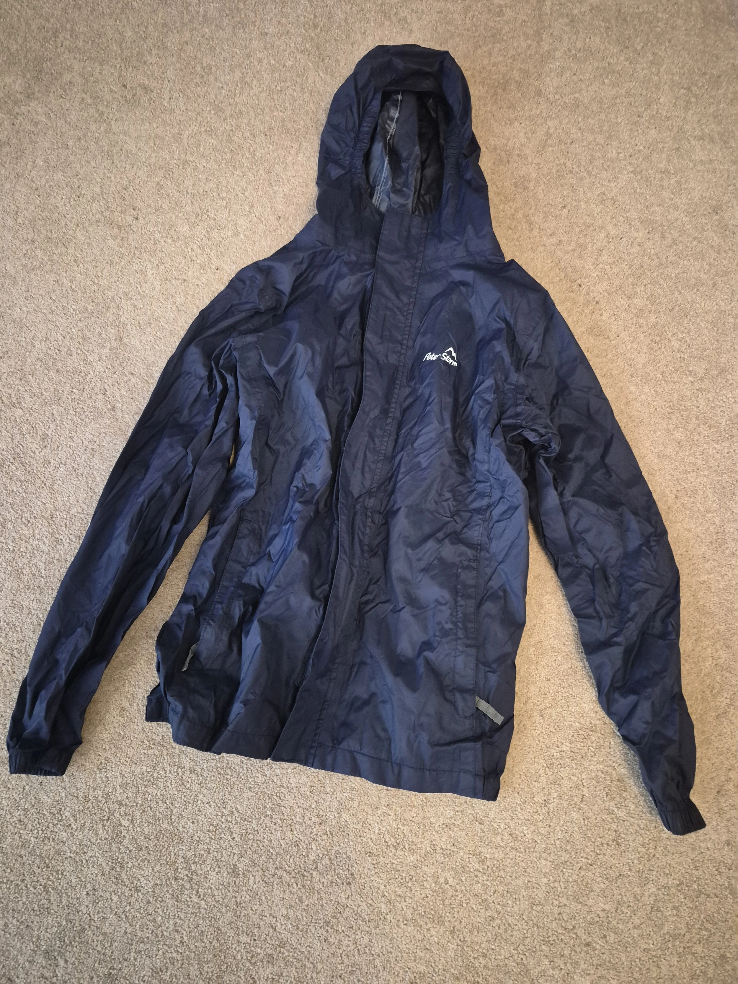 Peter Storm waterproof jacket (blue). 11-12y