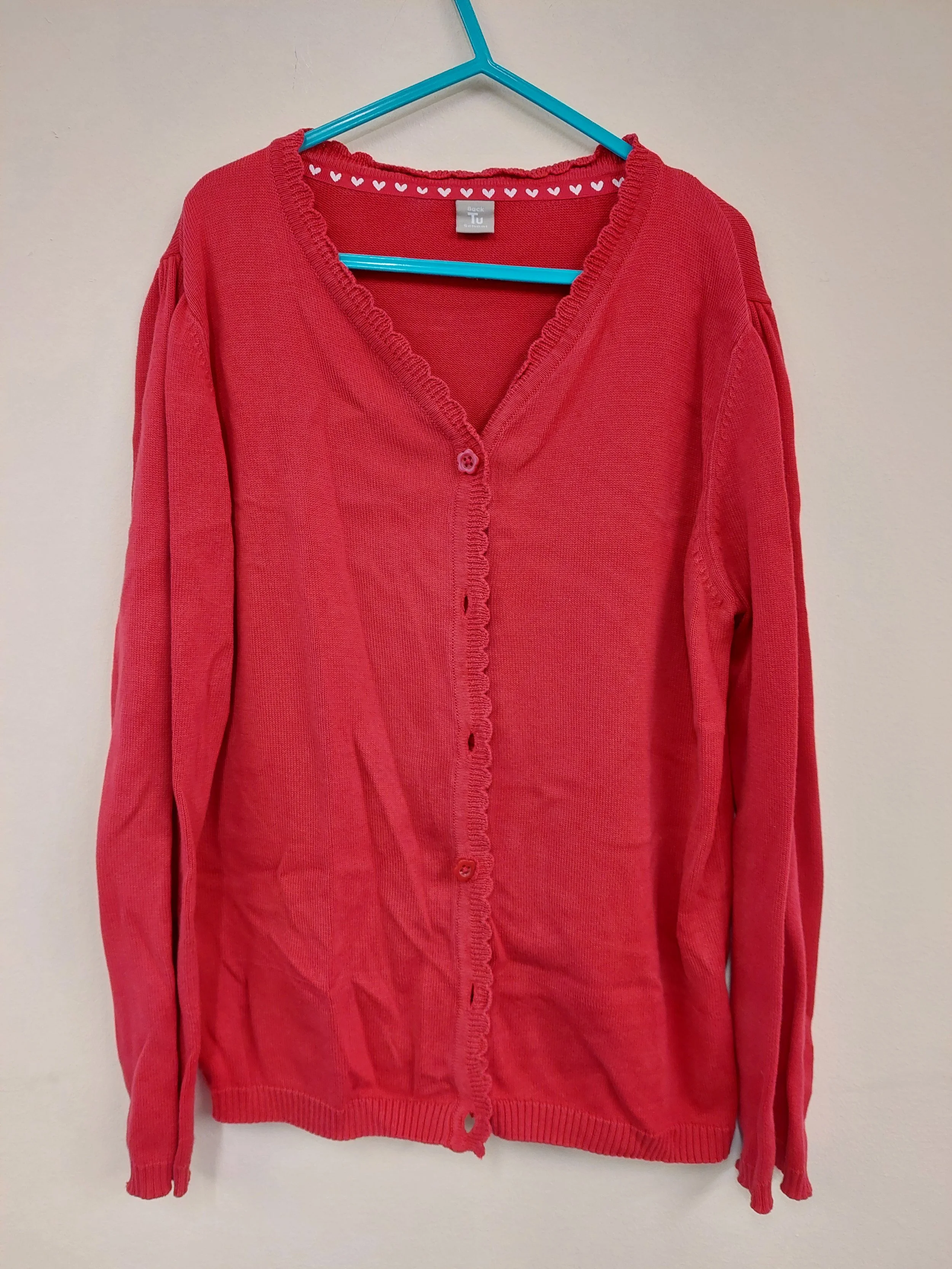 Red v-neck jumpers