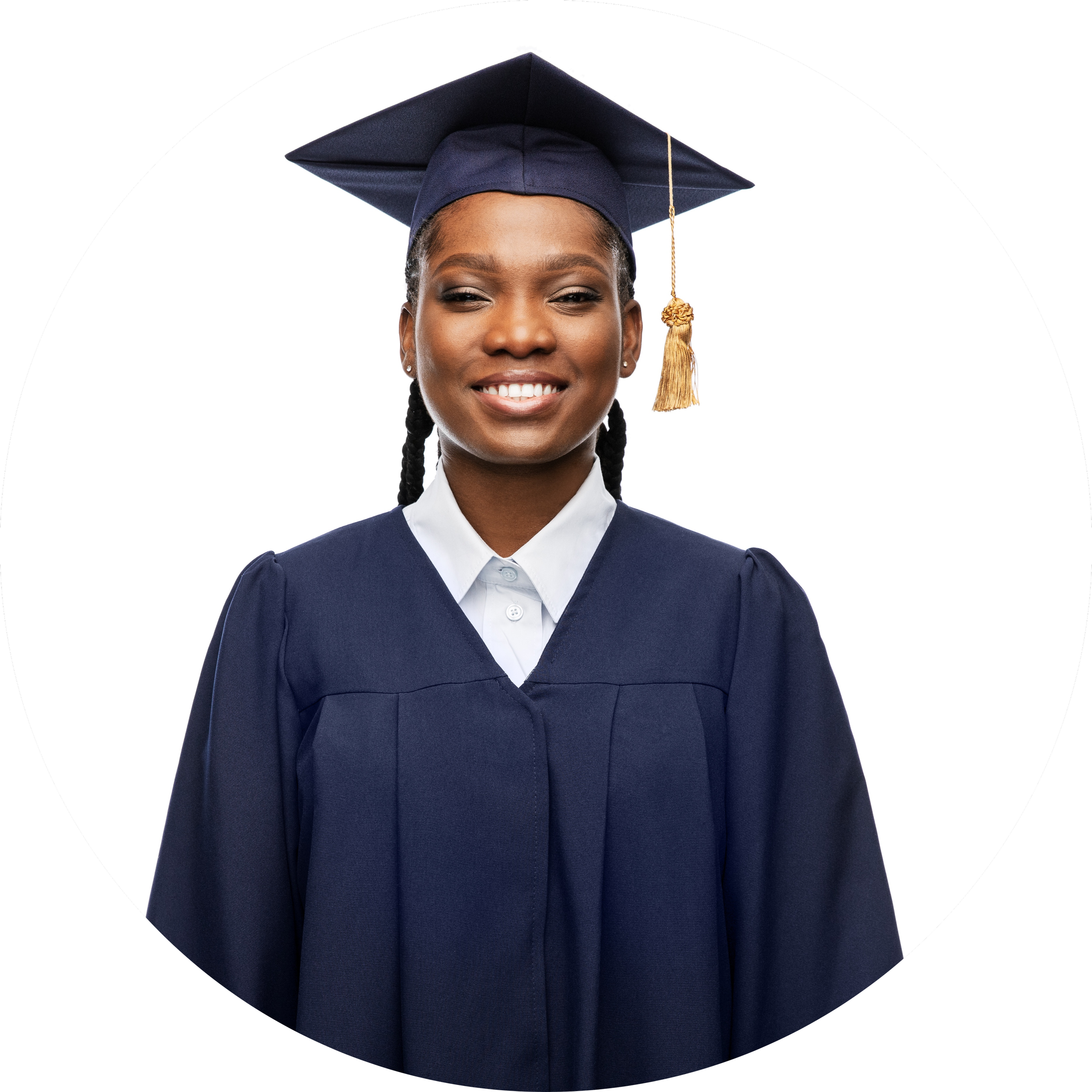 A young woman in a graduation cap and gown smiling in front of a white background.