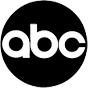 The ABC logo in white against a black circular background.