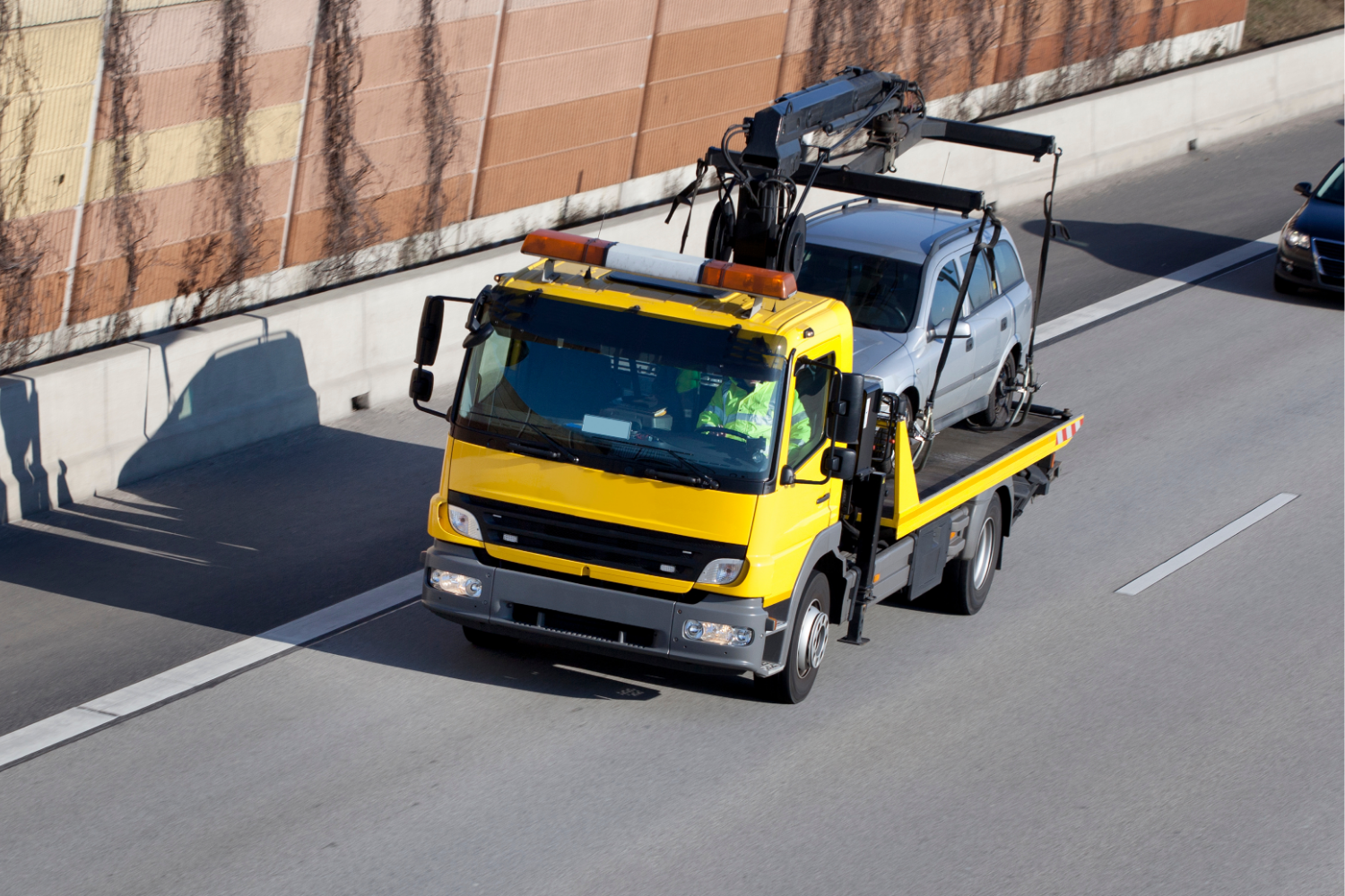 Vehicle Recovery vs. Towing: What’s the Difference and When Do You Need Each?