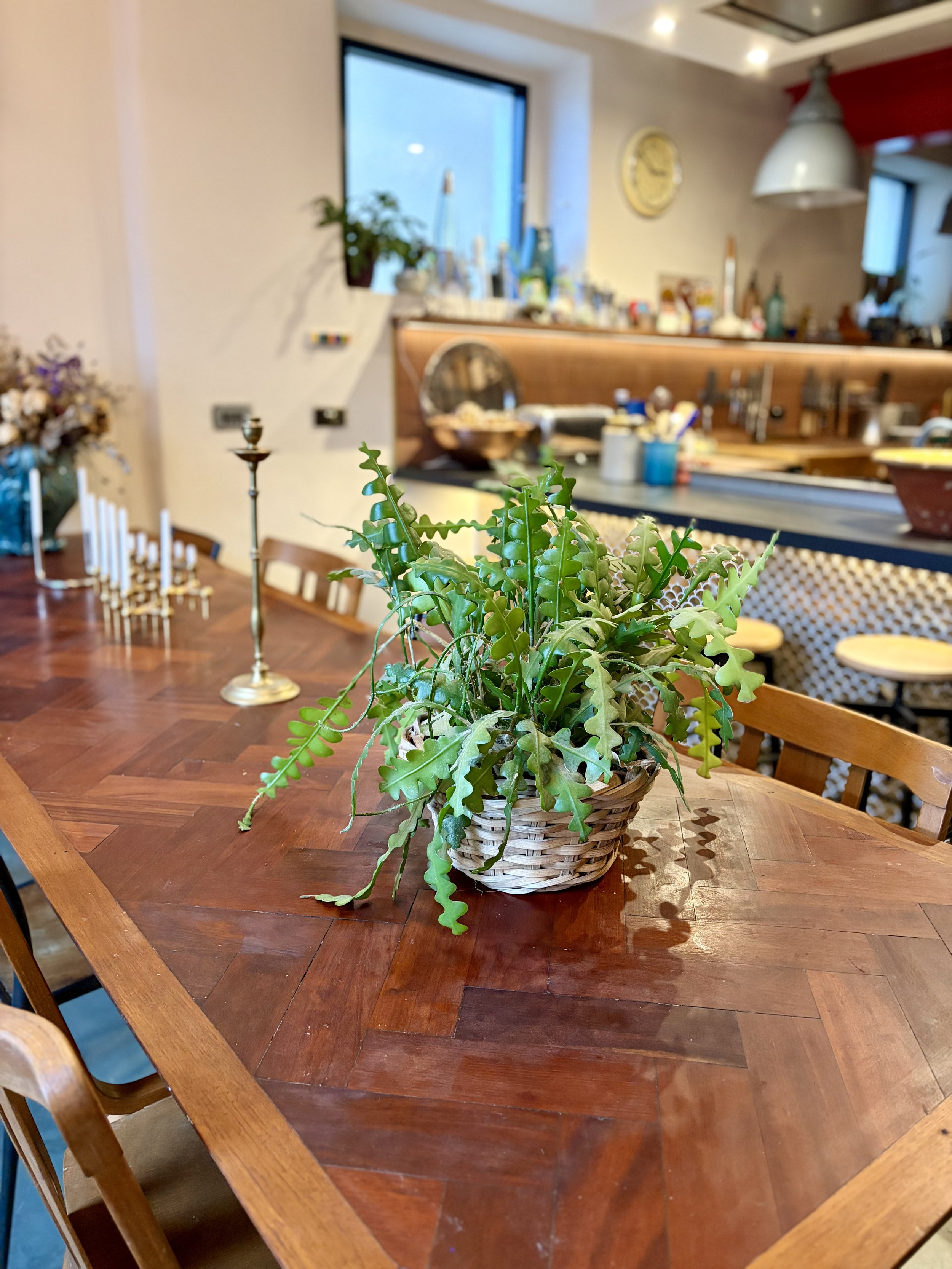 Reclaimed parquet flooring used for a tabletop