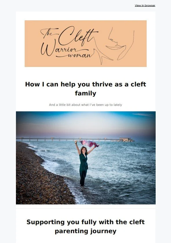 A woman standing by the ocean holding a pink cloth in the air with a pier in the background, promoting support for the cleft parenting journey.