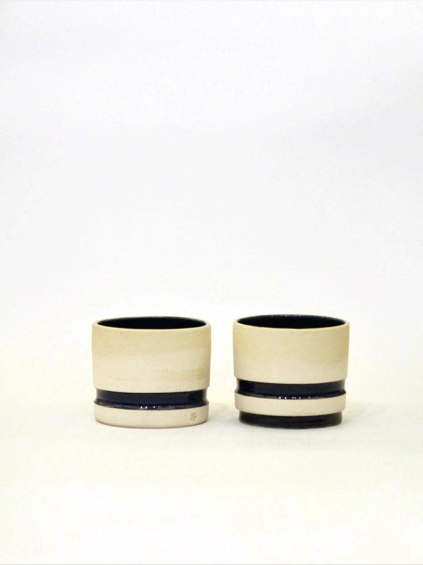 Controlled, precise, smart. Three things that don&rsquo;t come naturally to me but these coffee cups have in buckets (or cups). 

A totally new design. The success of these experiments is in the ergonomic indentation, which is a dark glassy strip tha