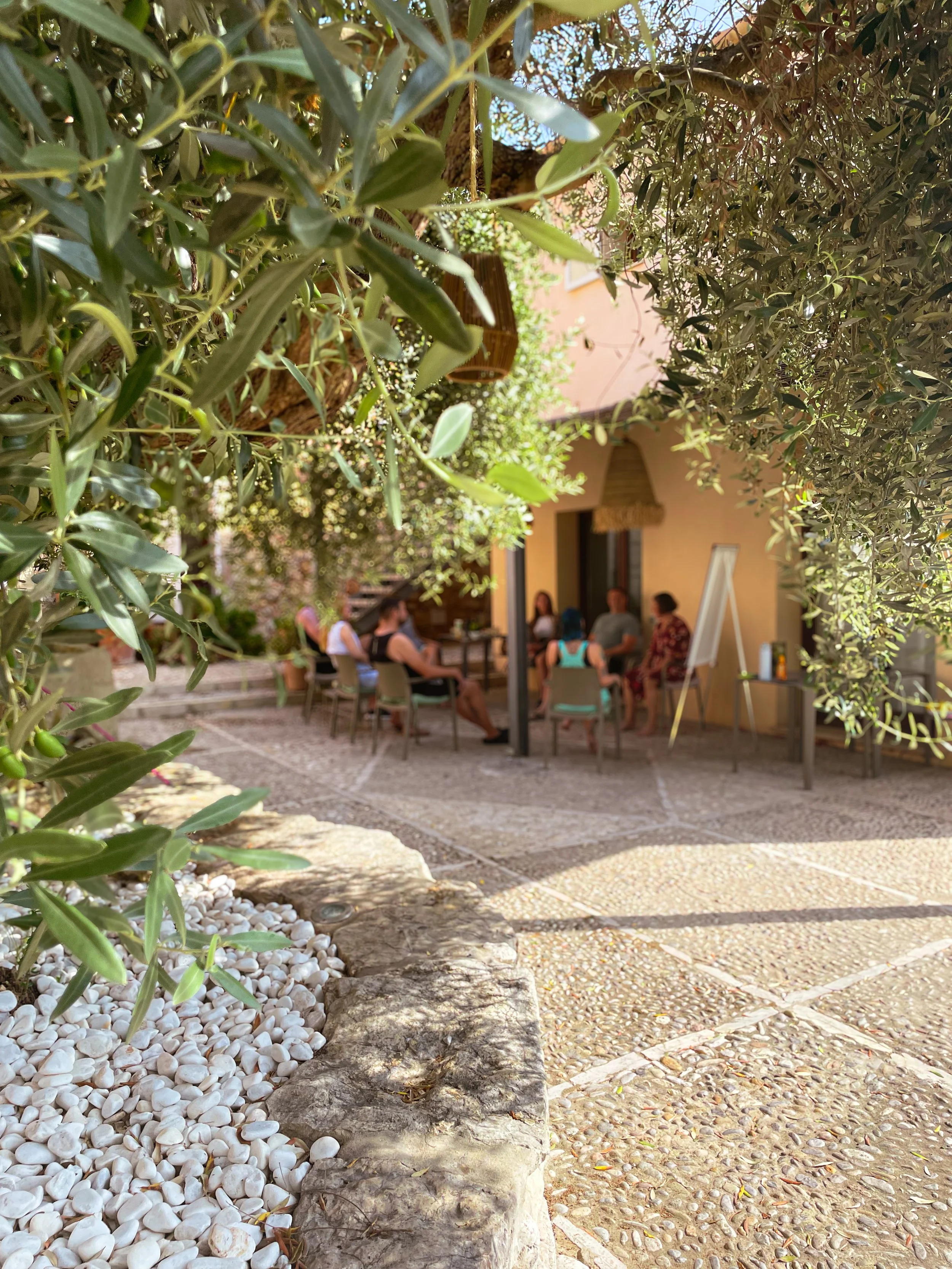 Retreat group sitting together, working, connecting