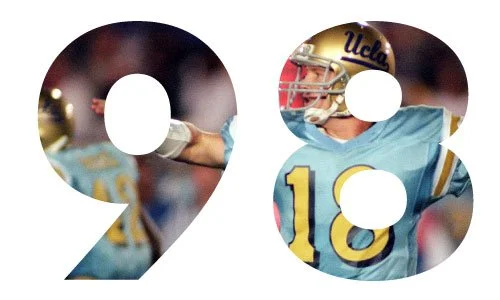 Number 98 with a football player in a blue UCLA jersey in the background.