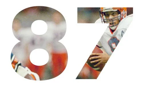 Number 8 and number 7 with blurred football player in background.