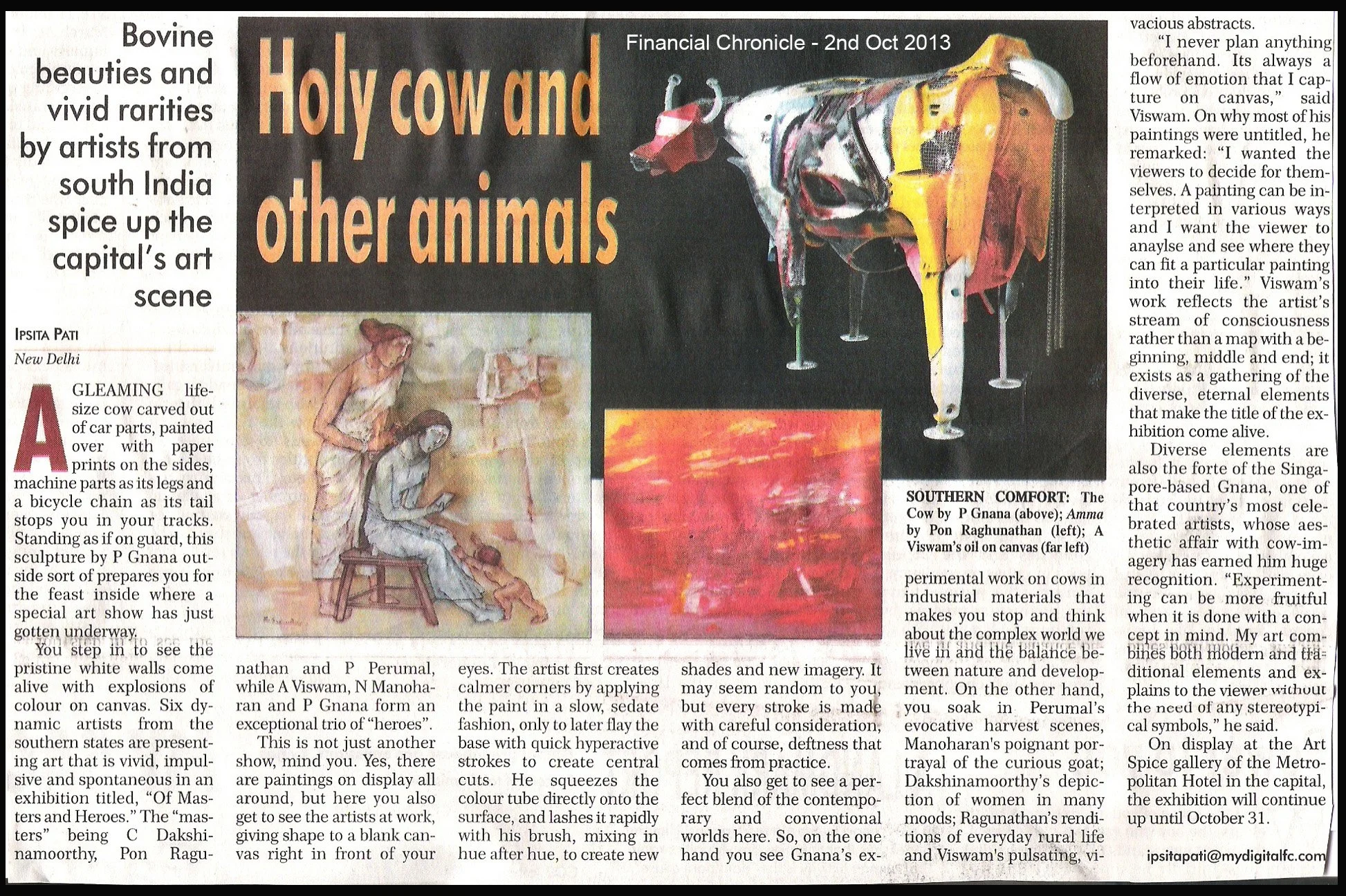 Photograph of a newspaper article titled 'Holy cow and other animals,' published in the Financial Chronicle on October 2, 2013. The article discusses cow-themed artwork, including a colorful painting of a cow and sculptures of cows, and mentions arti