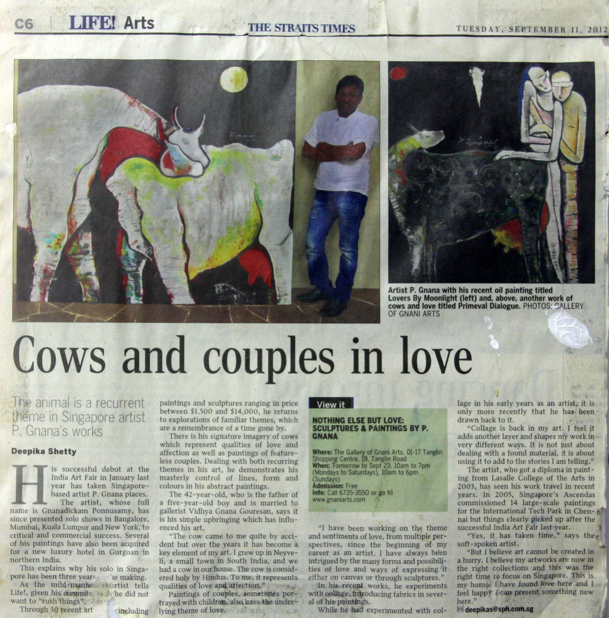 Newspaper clipping from The Straits Times Arts section, dated September 11, 2012, showing three images of paintings by artist P. Gnana. The first is a large colorful painting of a cow with a moon in the background, the second a photo of the artist st