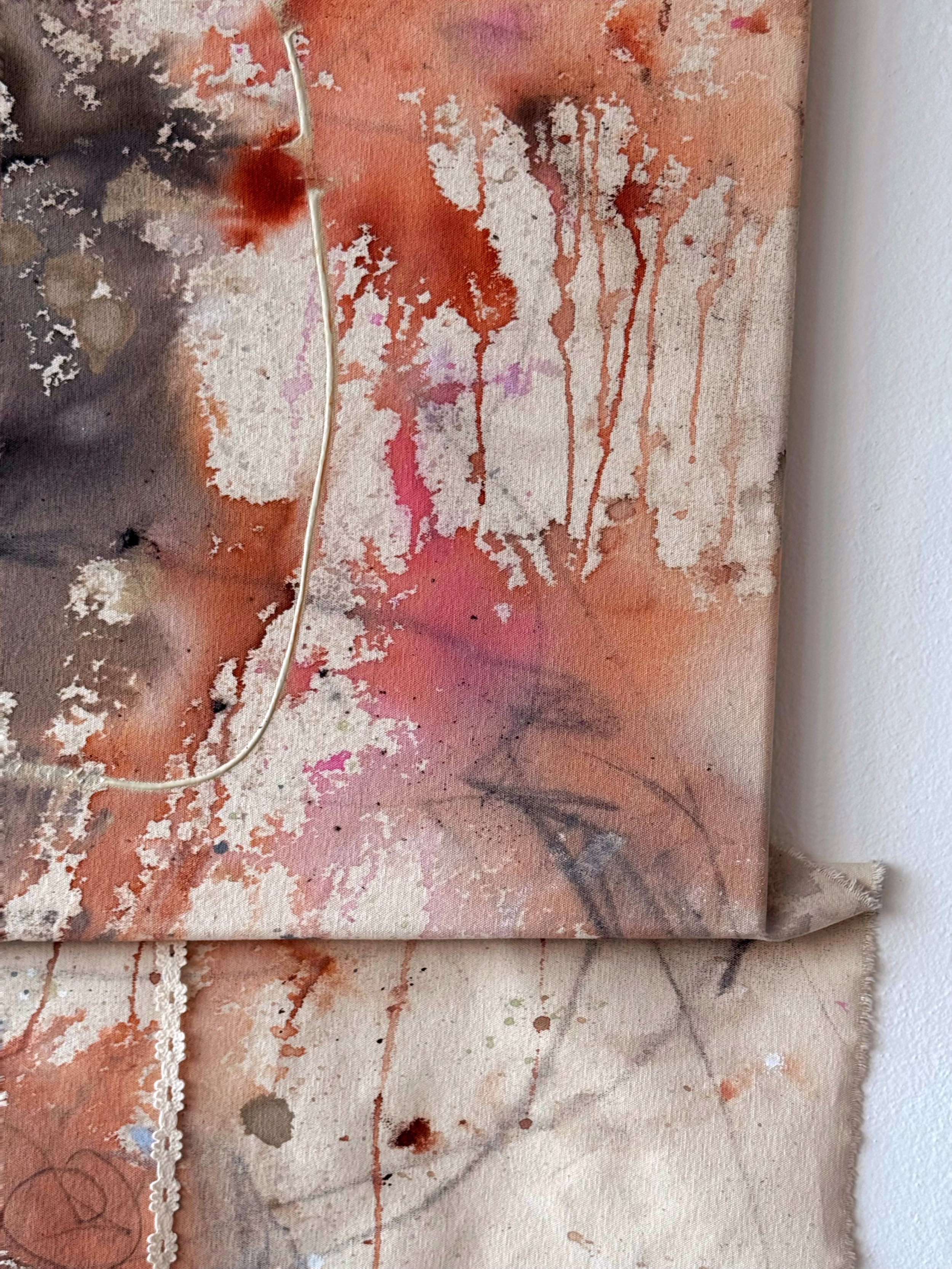 Close-up of abstract watercolor painting with shades of pink, red, beige, and dark purple, featuring paint splatters, drips, and fine lines.