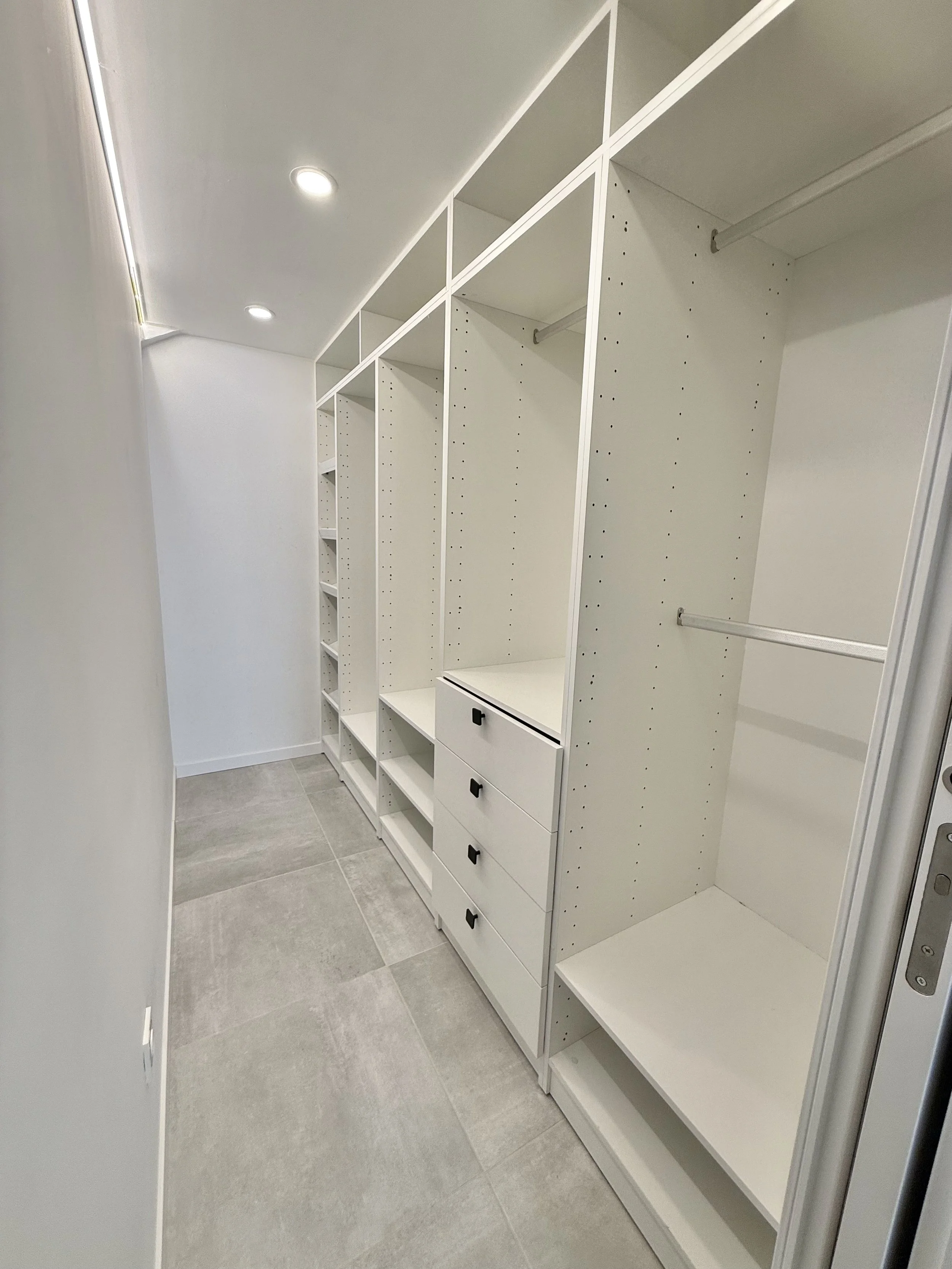 Walk-in dressing room in master suite