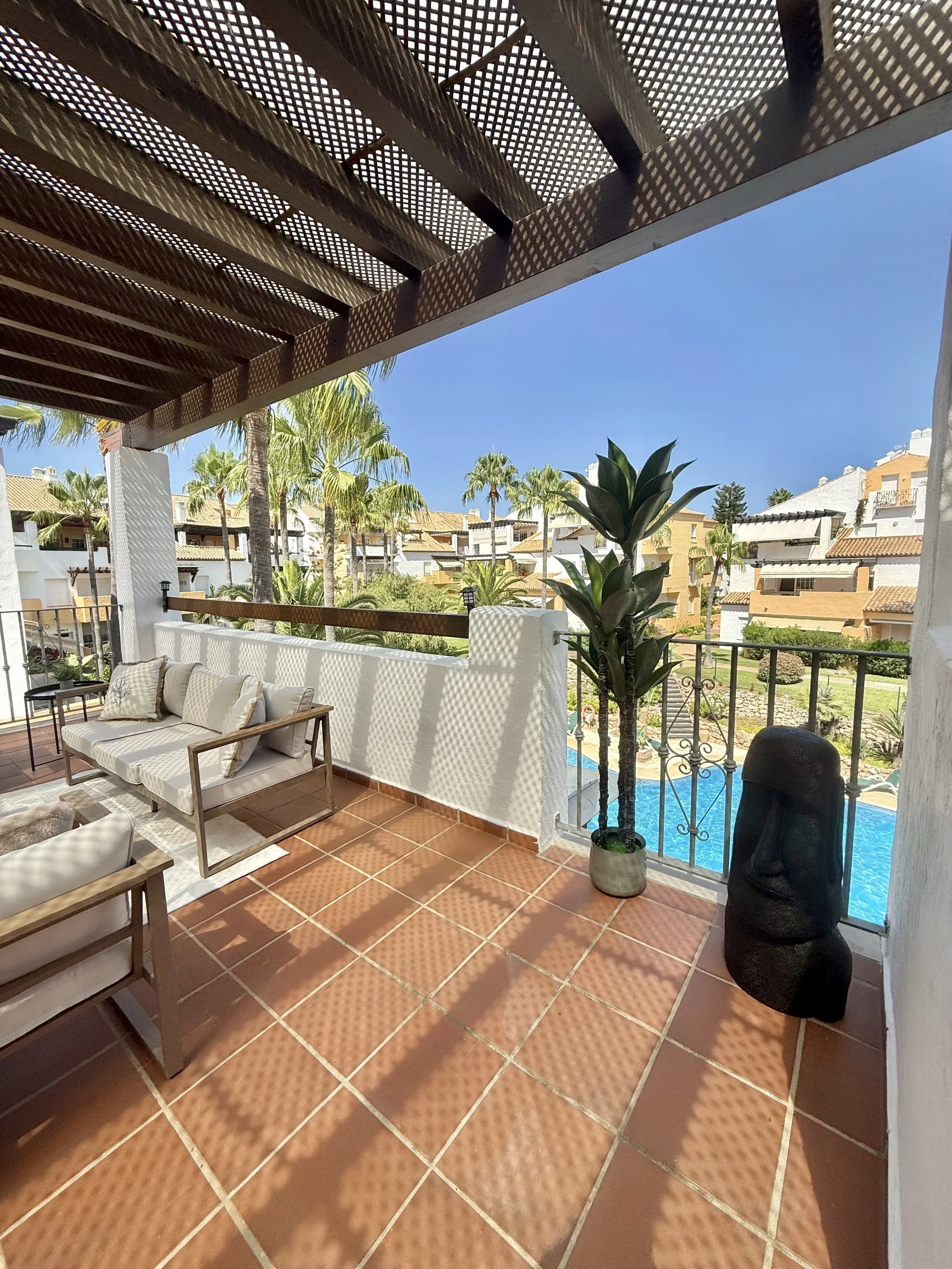 Evening terrace view at Marbella beachfront duplex, Costa del Sol