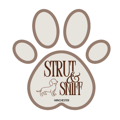 Dog paw print with the text "Strut & Sniff" and a small illustration of a dog, with the word "Winchester" beneath.
