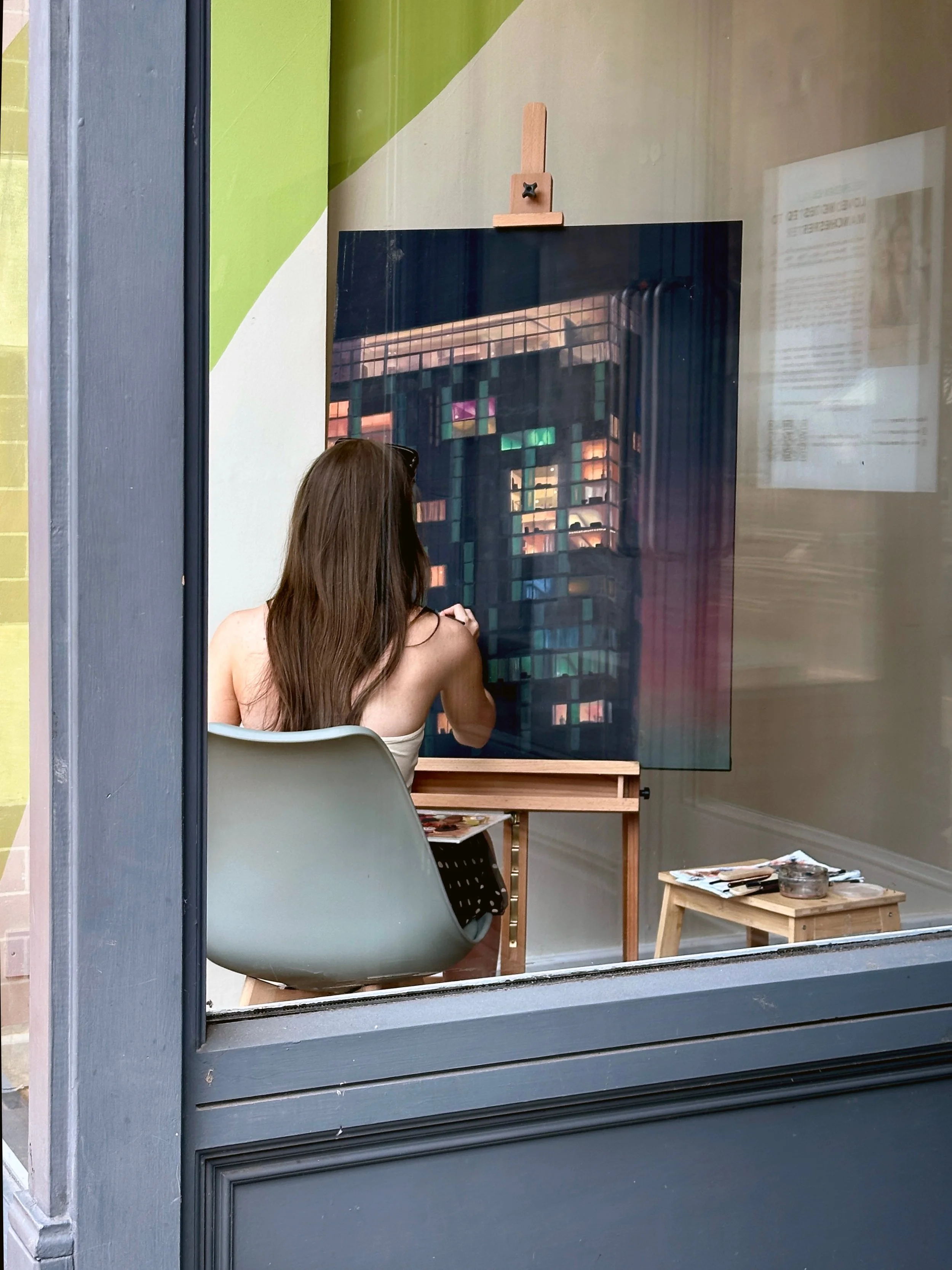 Through a window&hellip; into another window&hellip; into another window.

I spotted artist Helen Davies at work this week, in a shop window on Deansgate, painting one of Manchester&rsquo;s modern towers.

It struck me that I wasn&rsquo;t just lookin