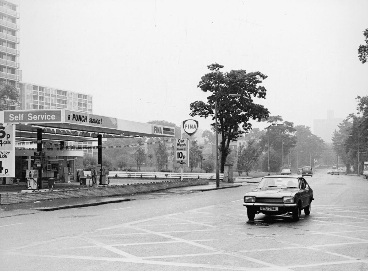 A new Lidl is due to open here this December&hellip;!!

But this is the corner of Wilmslow Road and Platt Lane in Rusholme, back in 1973.

On the left is the self-service Fina petrol station, advertising itself as &ldquo;a PUNCH station!&rdquo; It la