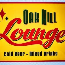 Sign for Oak Hill Lounge offering cold beer and mixed drinks.