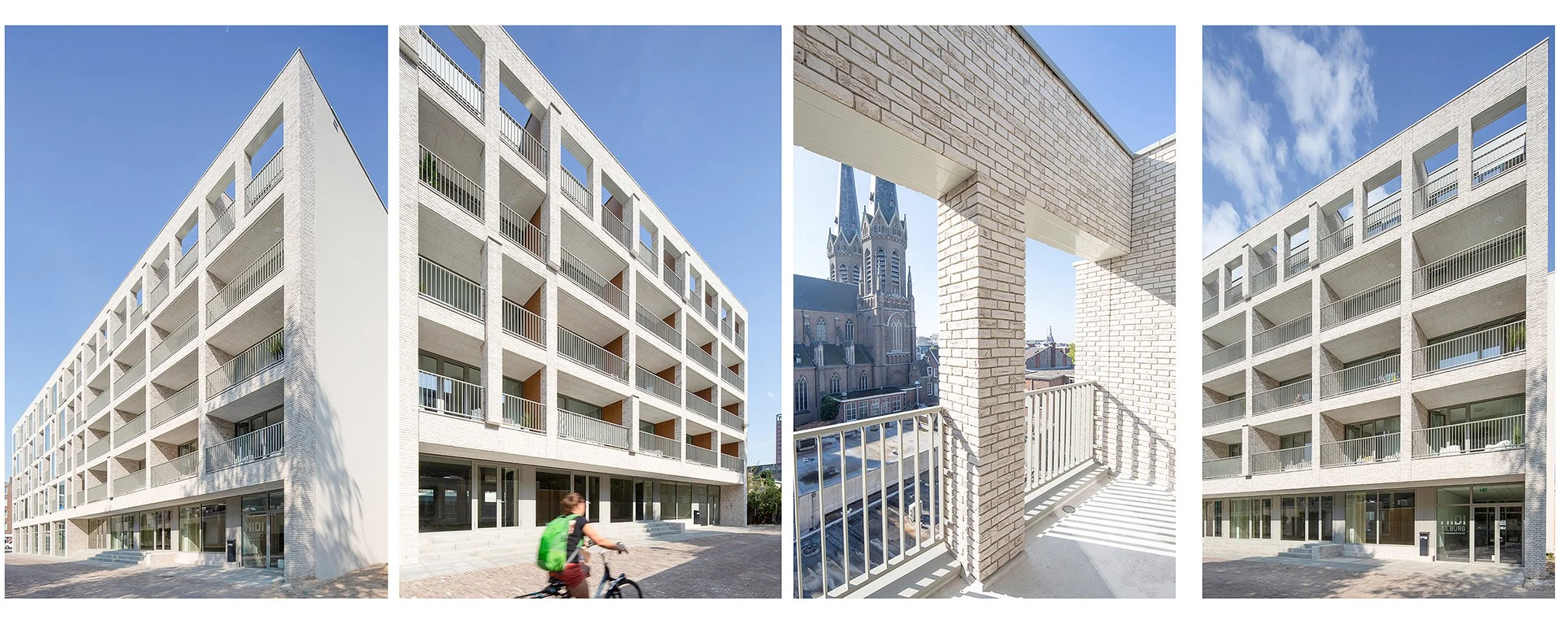 Modern wit geschakeld appartementengebouw met balkons, een persoon fietst voorbij, een balkon met zicht op een kerk met toren onder een blauwe hemel.