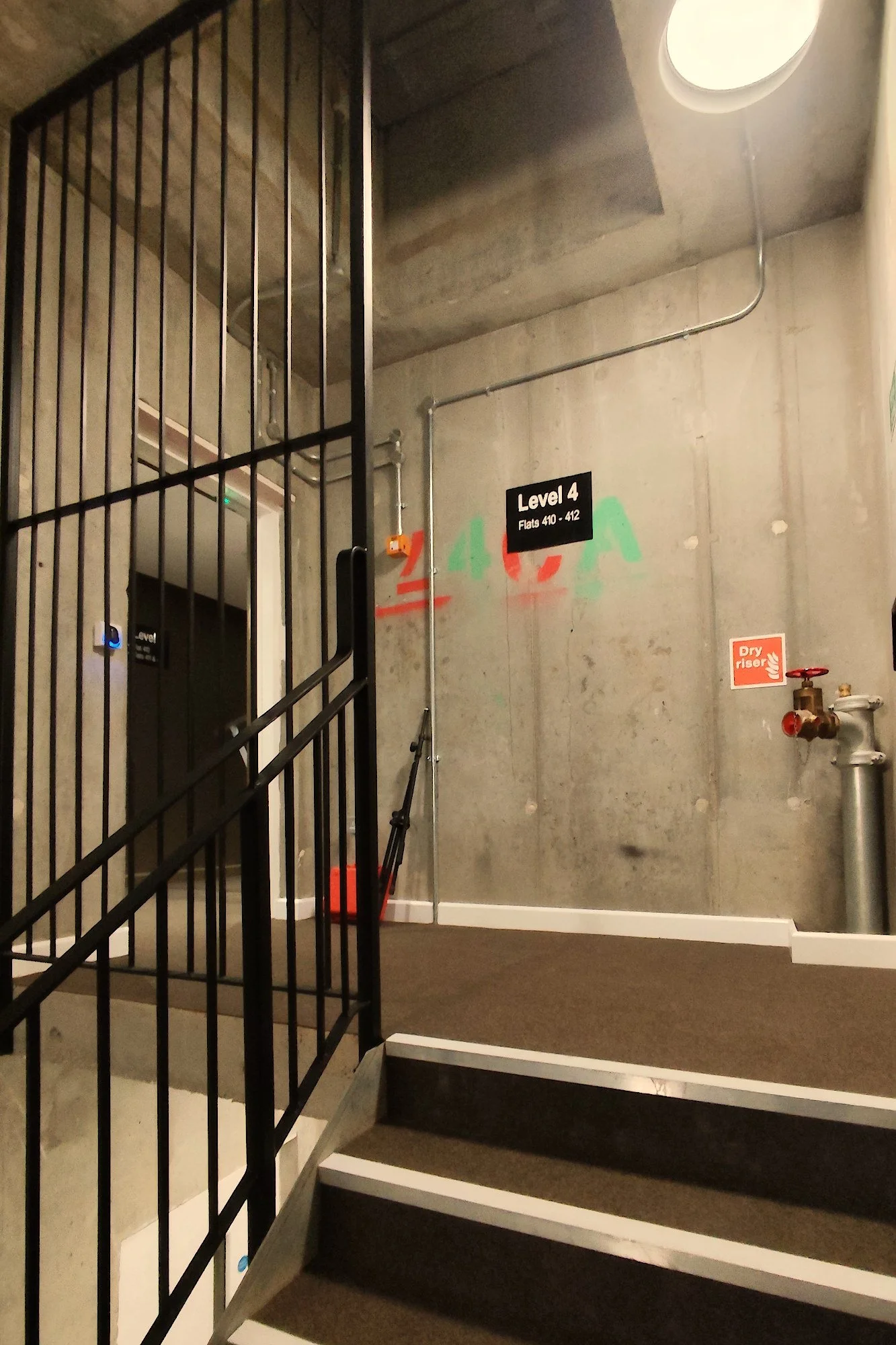 Concrete stairwell with durable hard wearing surfaces