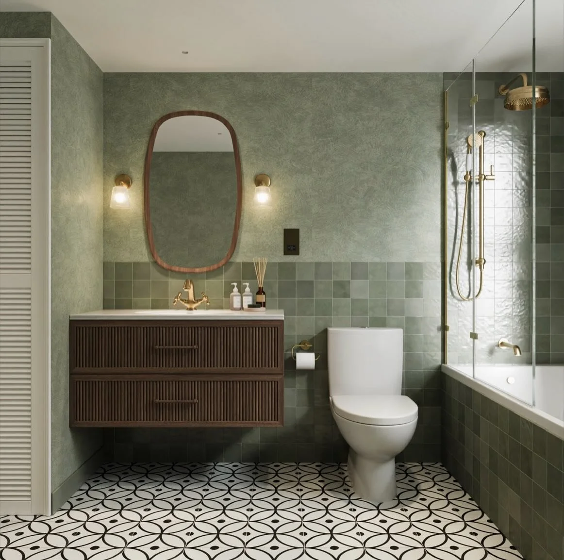 Green tiles, warm brass and fluted walnut - a bathroom designed to feel calm, layered and timeless.

Design &bull; Supply &bull; Install
Enquire via the link in our bio.

Tiles: @mandarinstoneofficial 
Vanity: @aquarocbathrooms 

#bathroomrenovation
