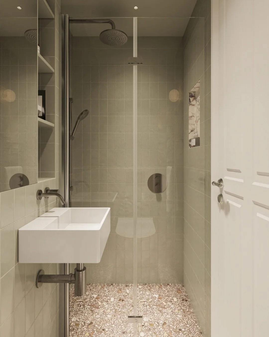 Soft green tile, terrazzo flooring and brushed stainless fittings.

A simple, well-resolved layout that balances storage and circulation within a compact space.

#bathroomrenovation
#bathroomrenovations
#bathroomdesign
#londonbathroom
#bathroominspir