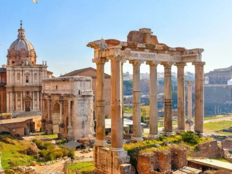 Ancient ruins of Roman columns and historical buildings in Rome, Italy