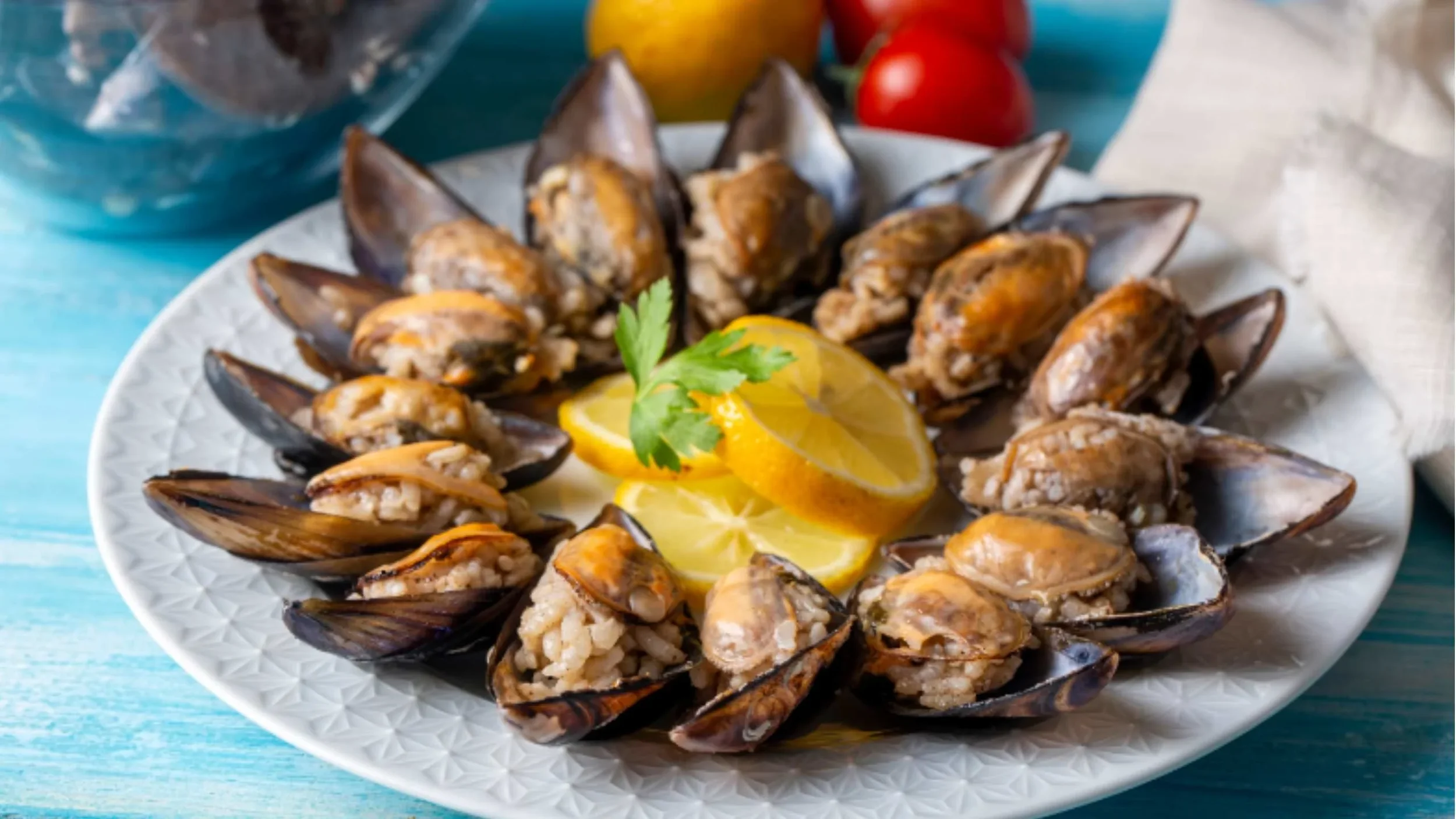 Stuffed mussels filled with spiced rice and lemon — a popular Turkish street food in Istanbul and Izmir.