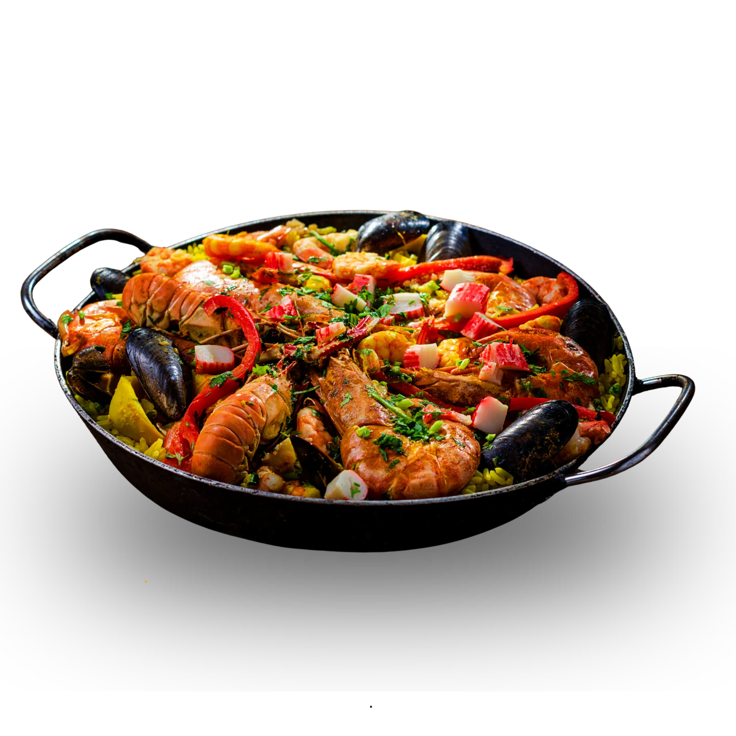 Seafood paella with lobster, mussels, shrimp, sausage, rice, and vegetables in a large black skillet.