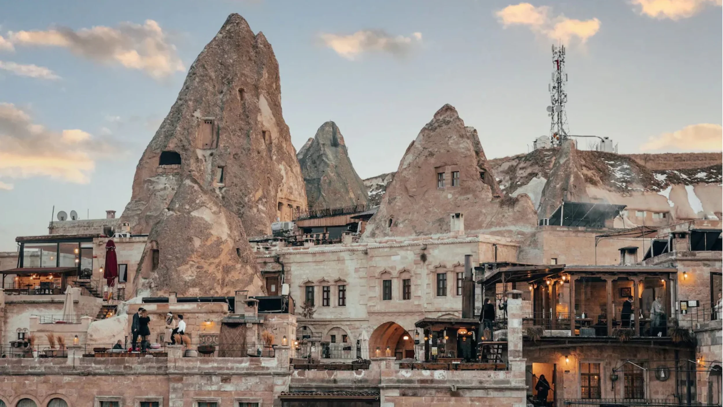 Authentic stone-carved cave hotel in Cappadocia, blending historic architecture with stunning natural scenery.