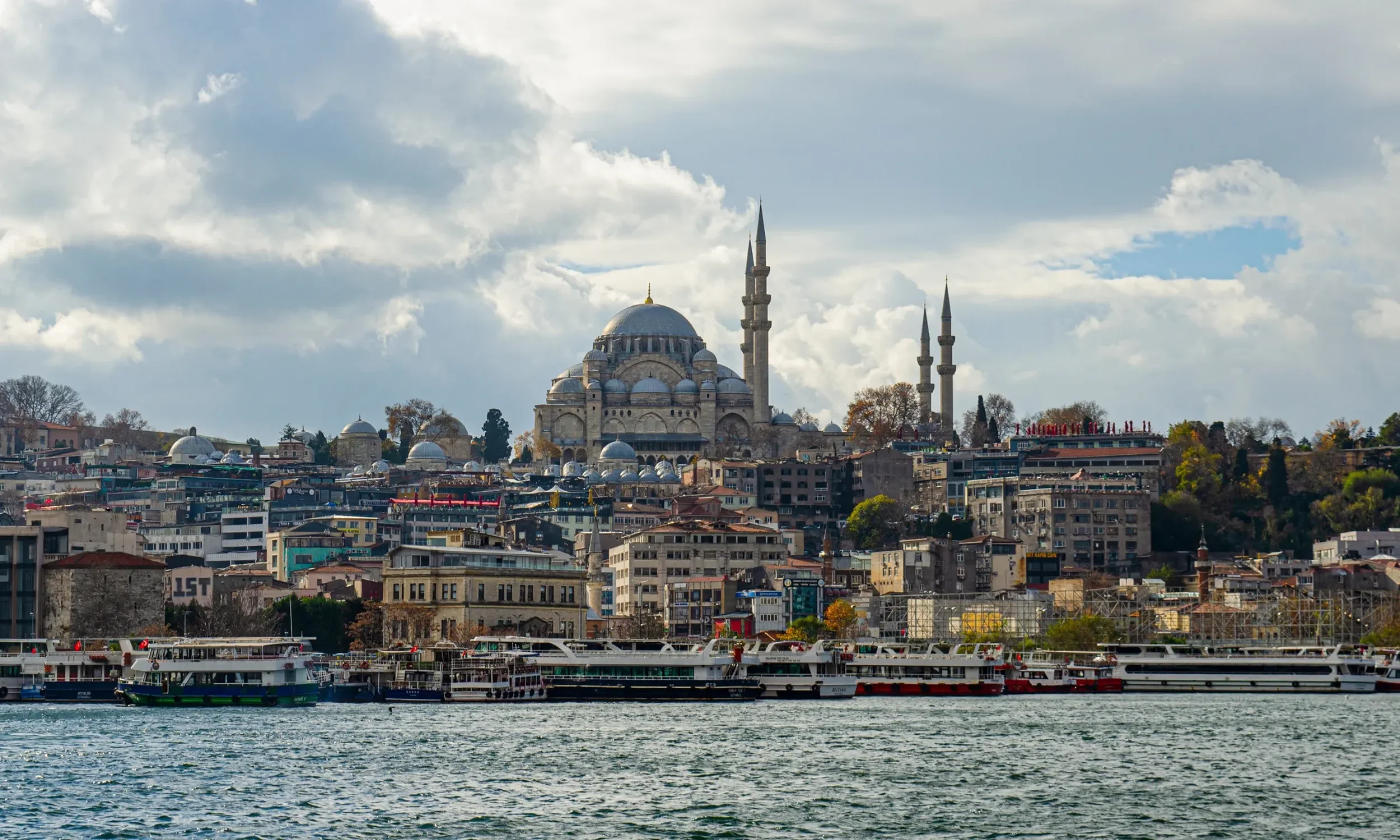 the view of a big mosque and port of eminonu in istanbul during november