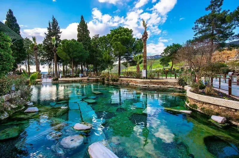 the view on the cleopatra pool in pamukkale