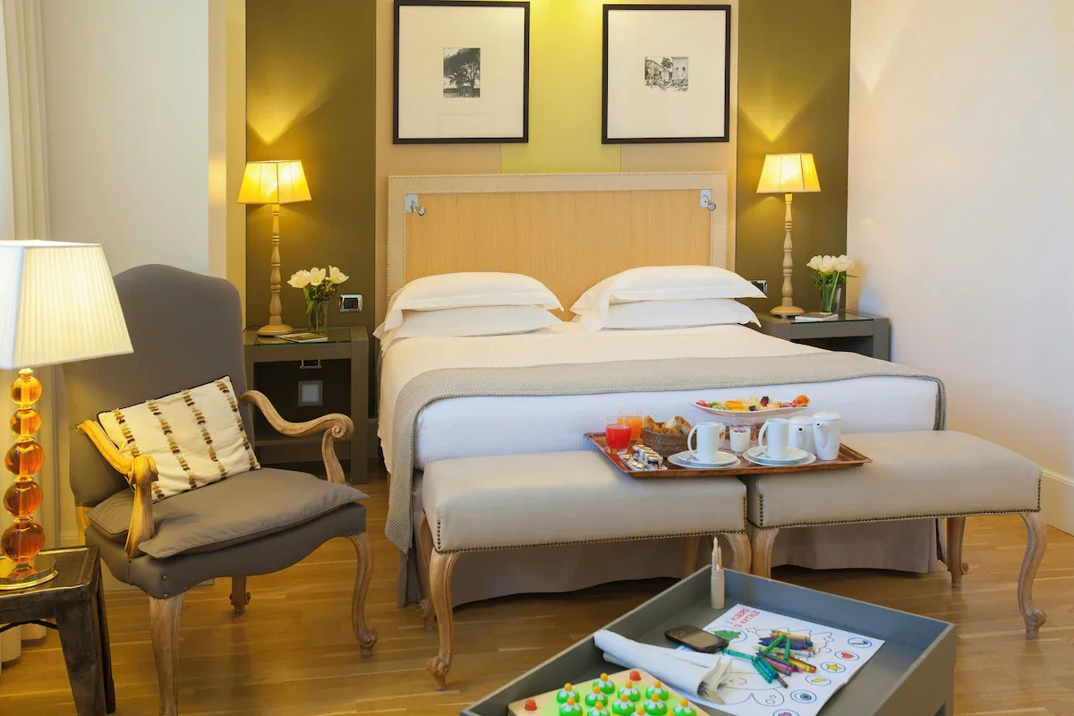 the bed room in starhotels tuscany
